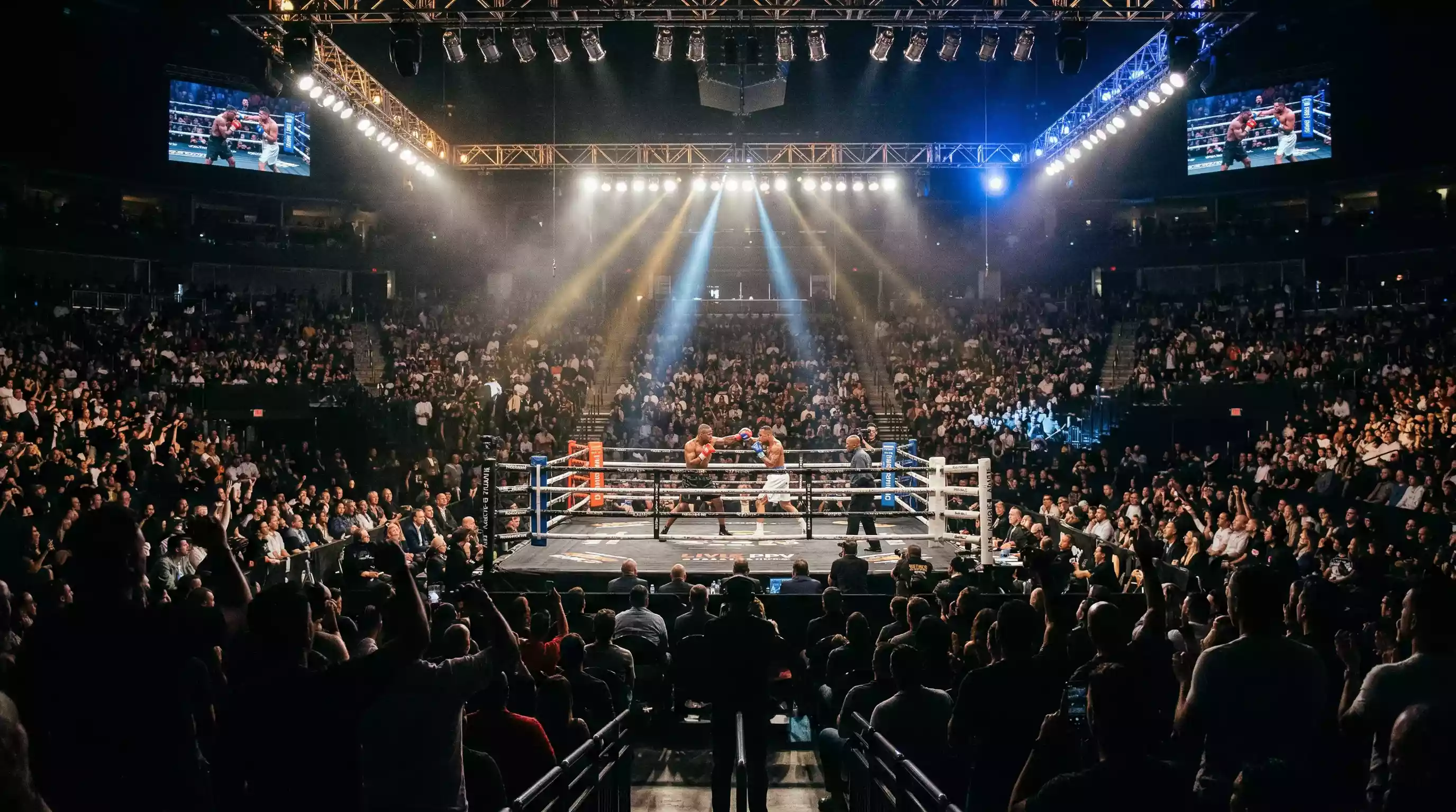 Salle de boxe pleine de spectateurs sous les lumières lors d'une soirée de gala